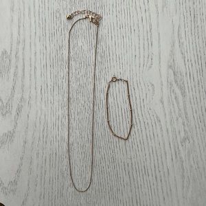 Thin gold necklace and bracelet